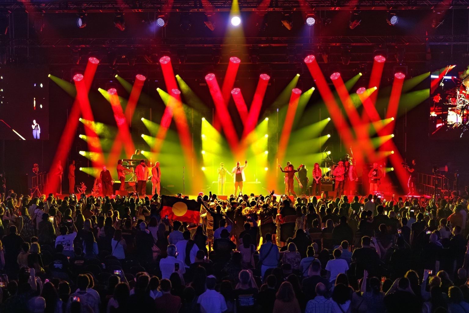Yothu Yindi performing on stage at John Cain Arena for Victoria's Treaty: It's Here event.